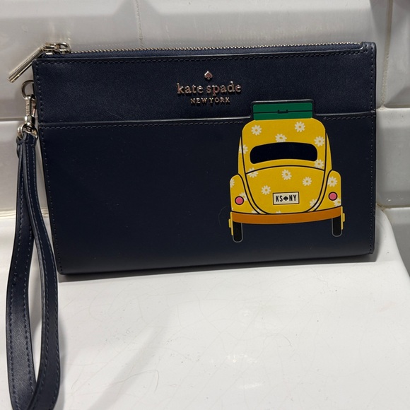 kate spade Handbags - Kate Spade New York Navy Blue NYC Taxi Wristlet Clutch